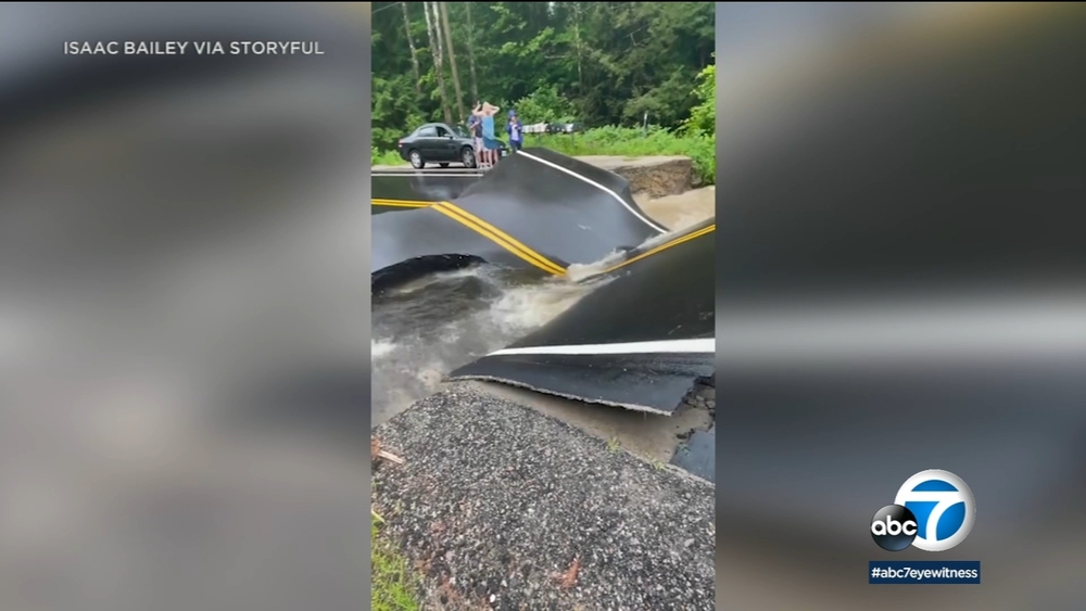 New Hampshire road buckles, collapses after flash flooding