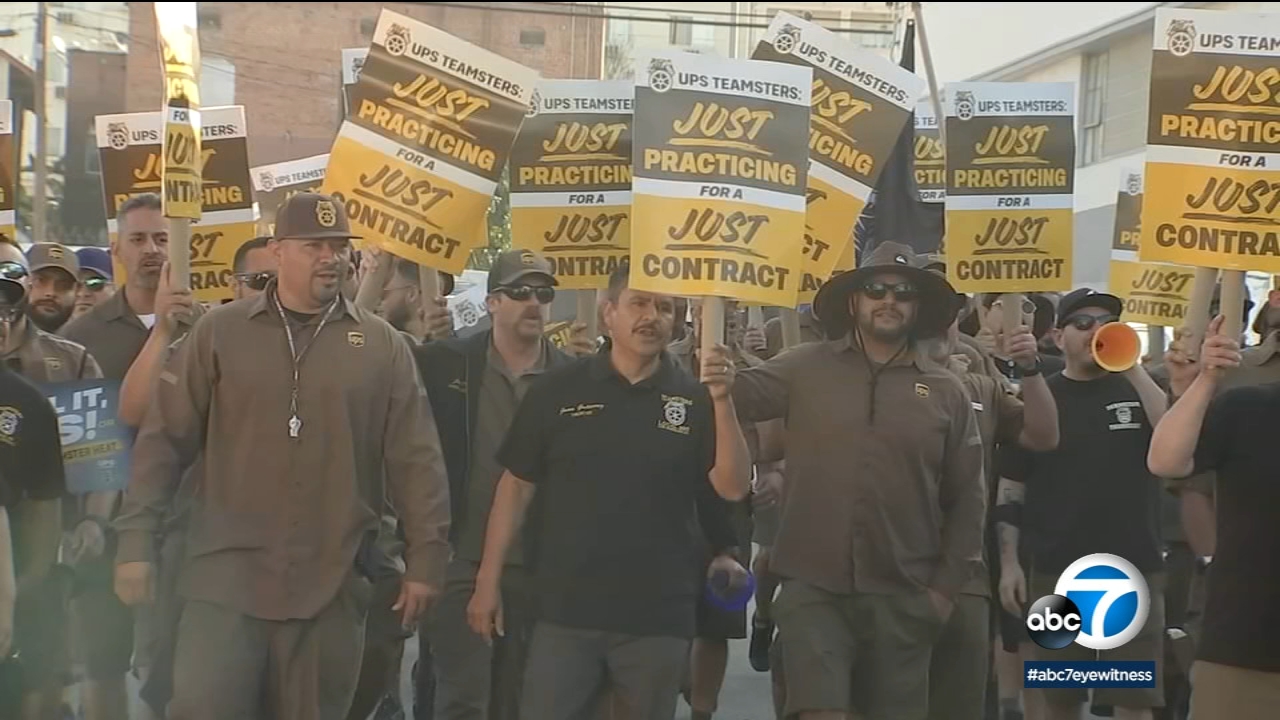 UPS workers rally in downtown LA as as contract deadline approaches