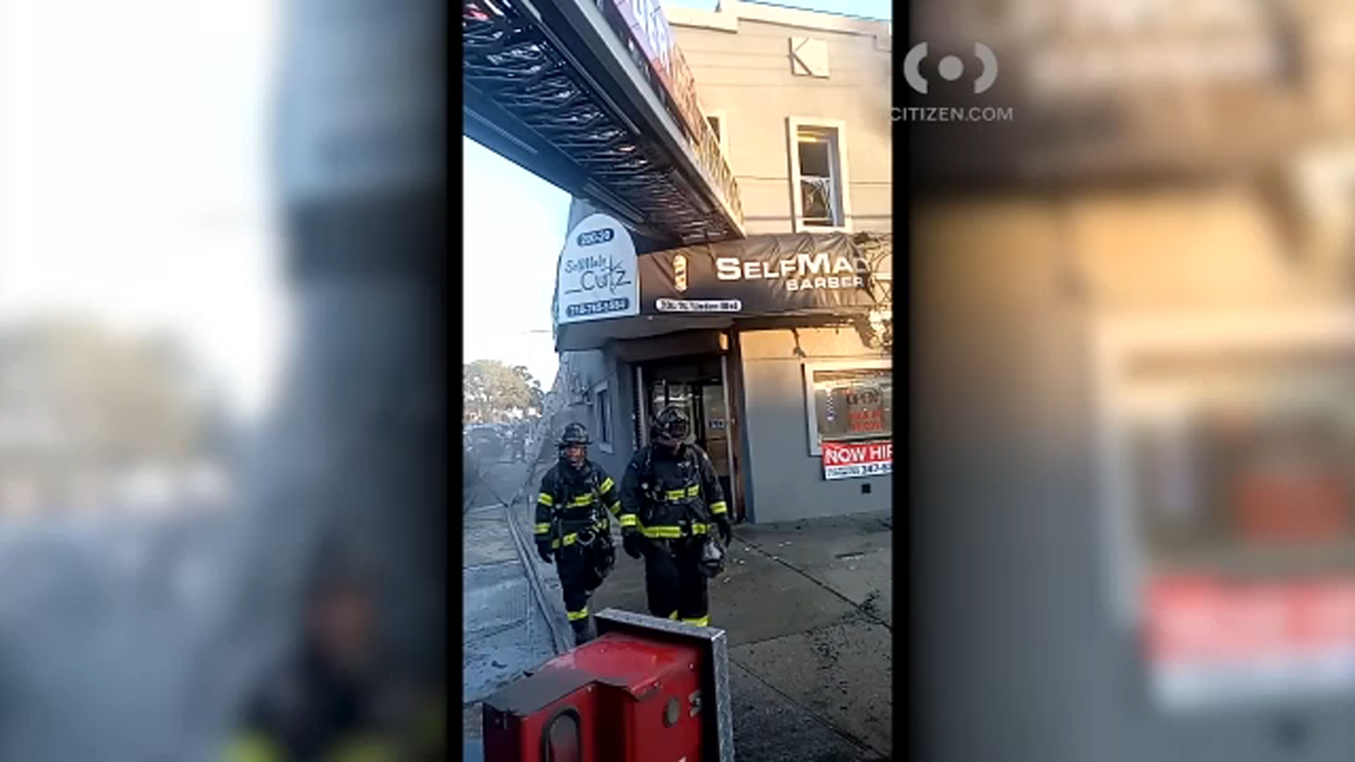 2 rescued from burning apartment above Queens barbershop