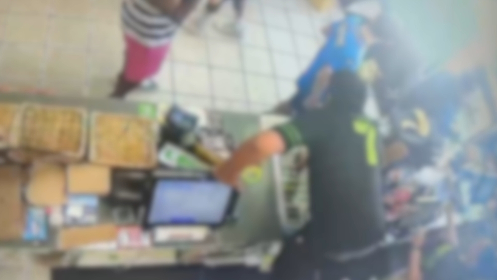 7-Eleven clerk leaps from behind counter