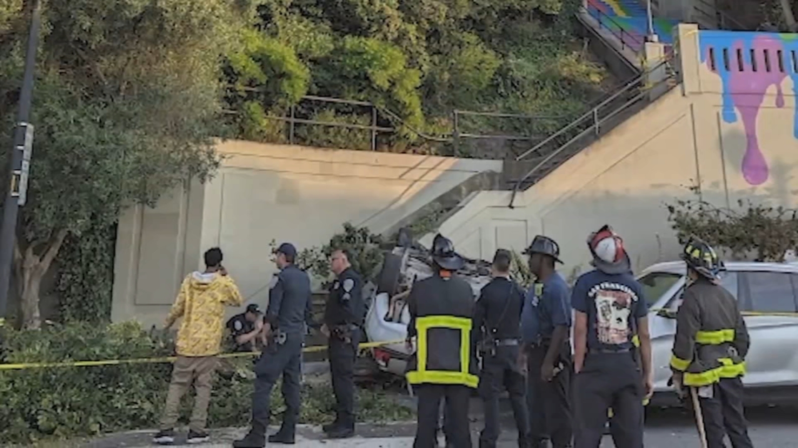 San Francisco car crash stairs Vehicle tied to carjacking tumbles down