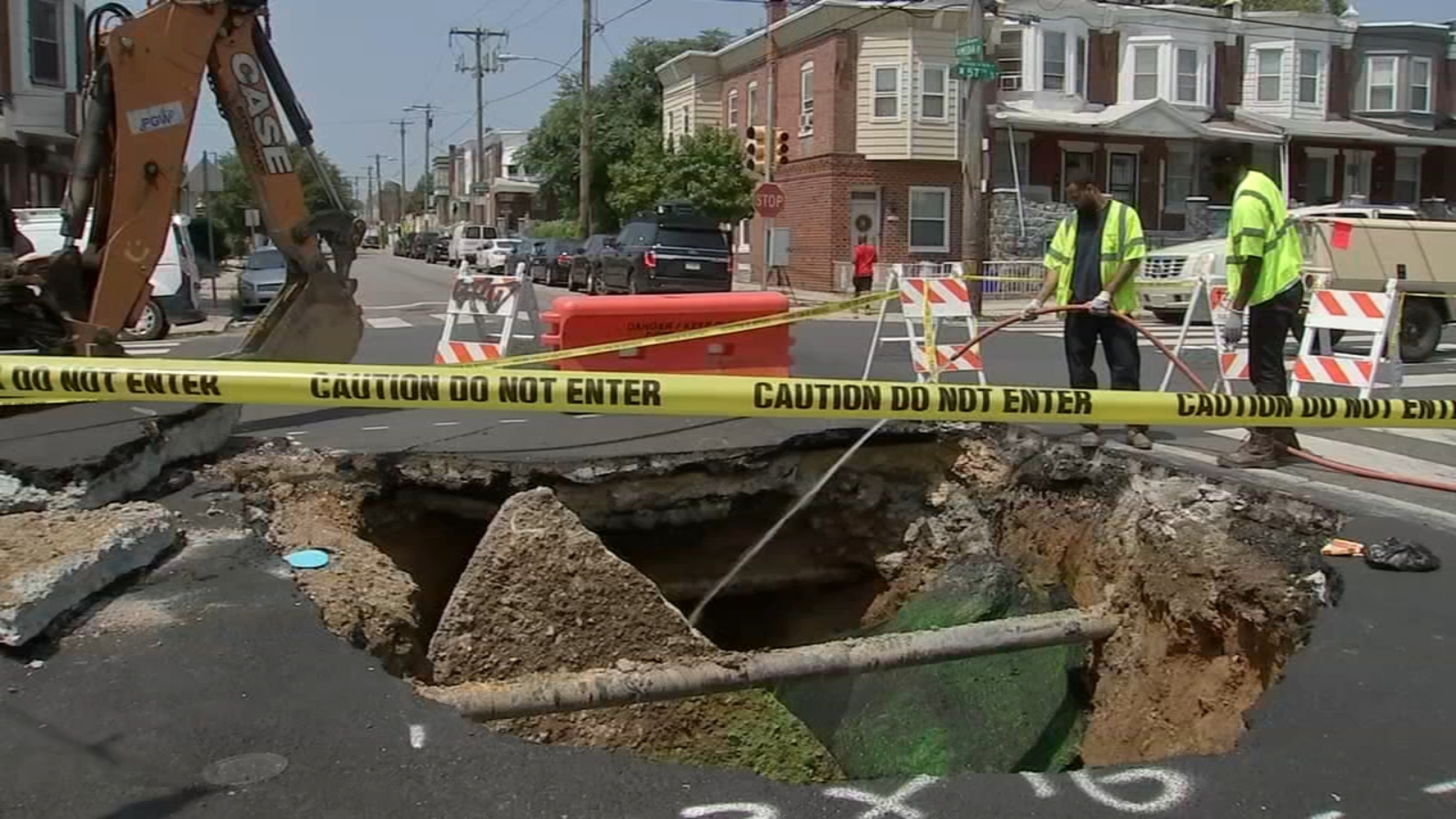 Massive sinkhole opens up at 57th and Media streets in West