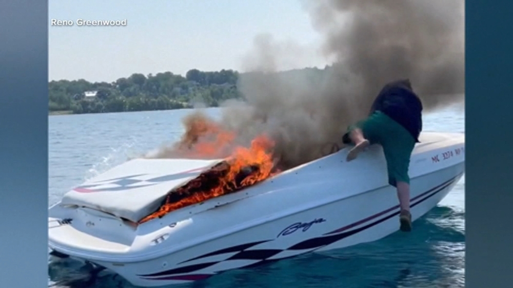 'It's gonna blow': Video captures rescue from fire-engulfed boat