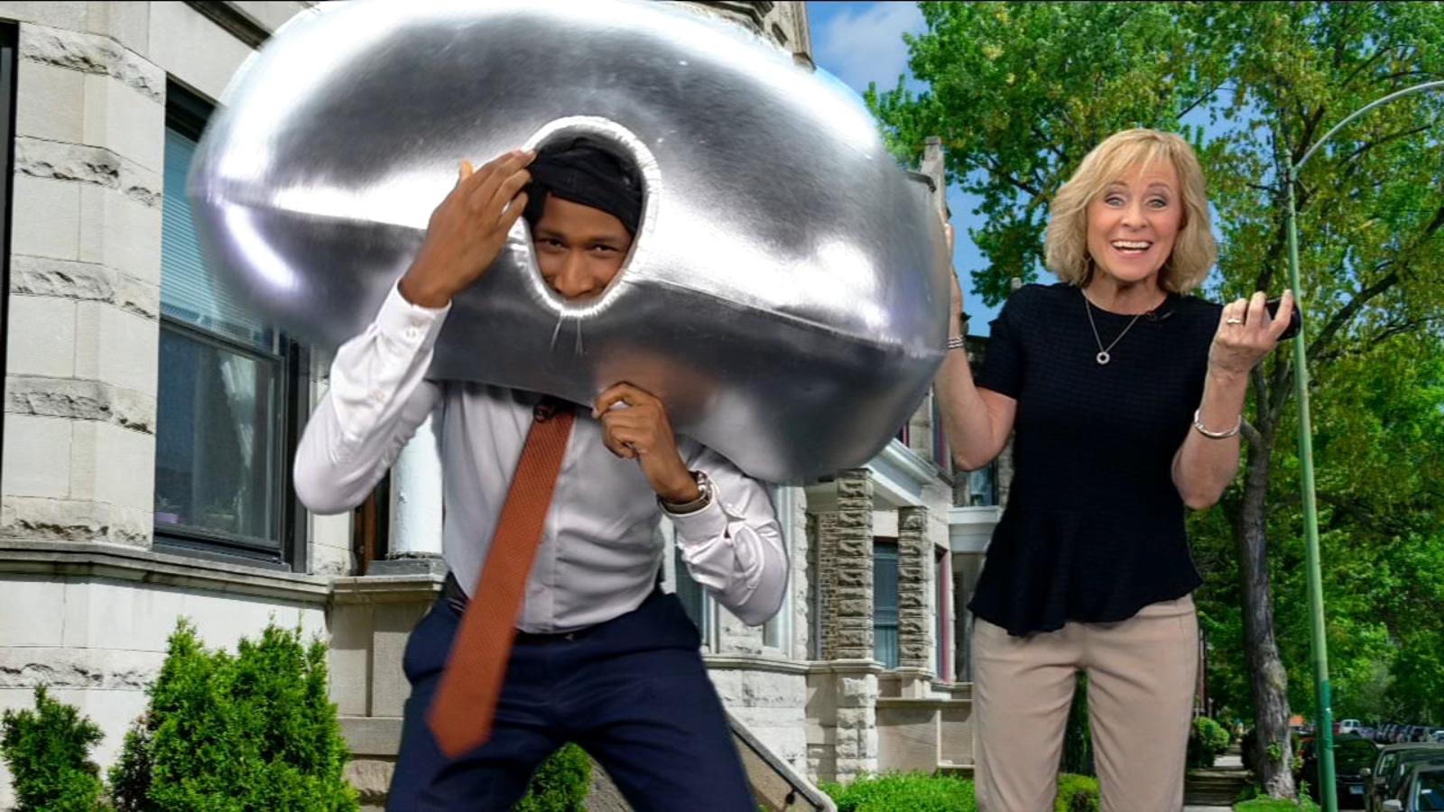 The Bean construction Terrell wears costume during Tracy's forecast
