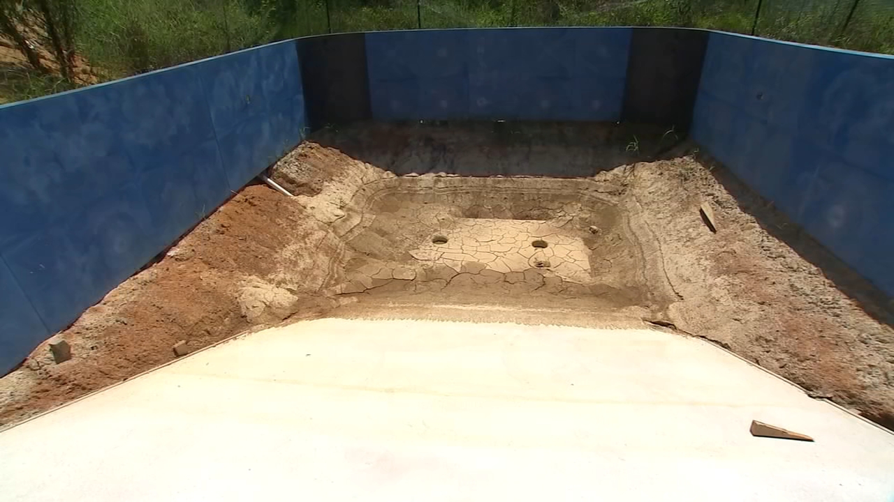 Unfinished swimming pools | Homeowners left with holes in yards, out thousands after paying Fayetteville pool contractor - Vimarsana News