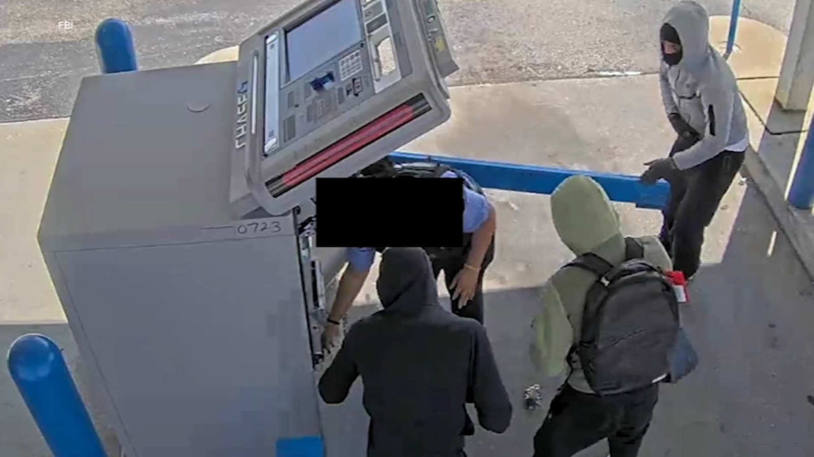 lansing-armed-robbery-3-men-rob-armored-car-at-gunpoint-near-chase-atm