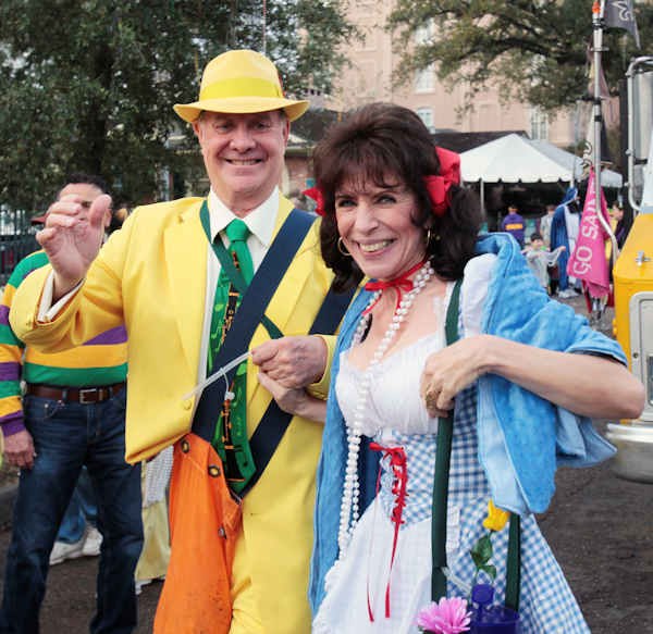 Larry Zimmer and his wife Charlotte Zimmer march down St. Charles Ave. with Pete Fountain's Half Fast Marching Club as it begins to parade through the streets of New Orleans, Tuesday, Feb. 21, 2012. This is the last day of the Mardi Gras celebration ending at midnight, after a day long celebration of parades, marching groups and people in costumes. (AP Photo/Bill Haber)