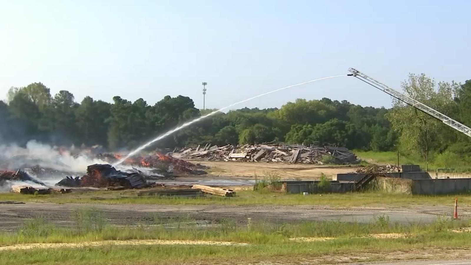 Fayetteville fire Pile of logging timber catches fire along Shaw Mill