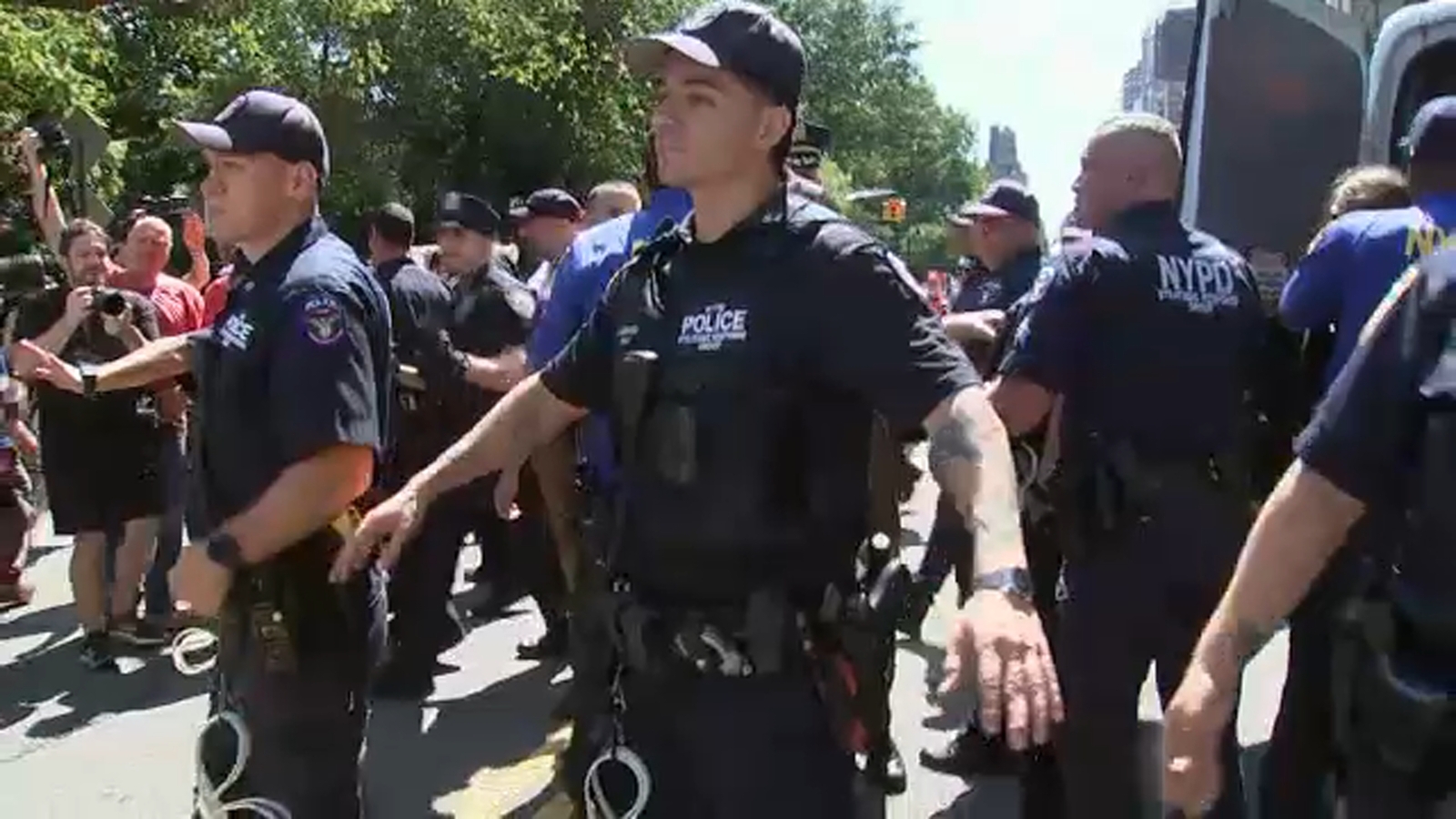 Heated protests outside Gracie Mansion over migrant crisis