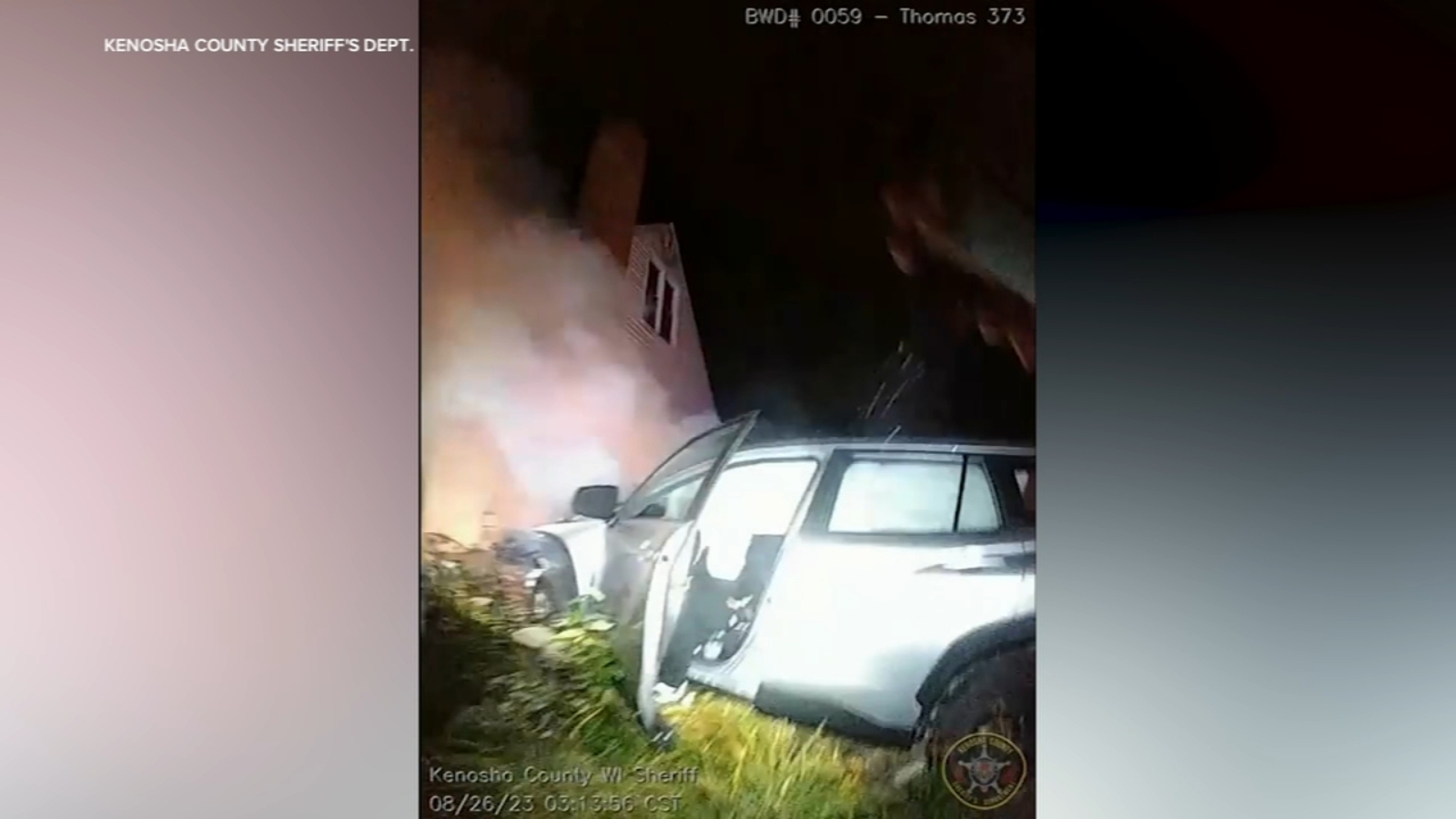 Driver rescued by deputy after crashing into Kenosha house causing fire