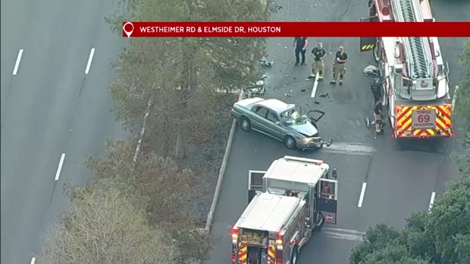Houston traffic accident Rescue crews work to free person from 3car
