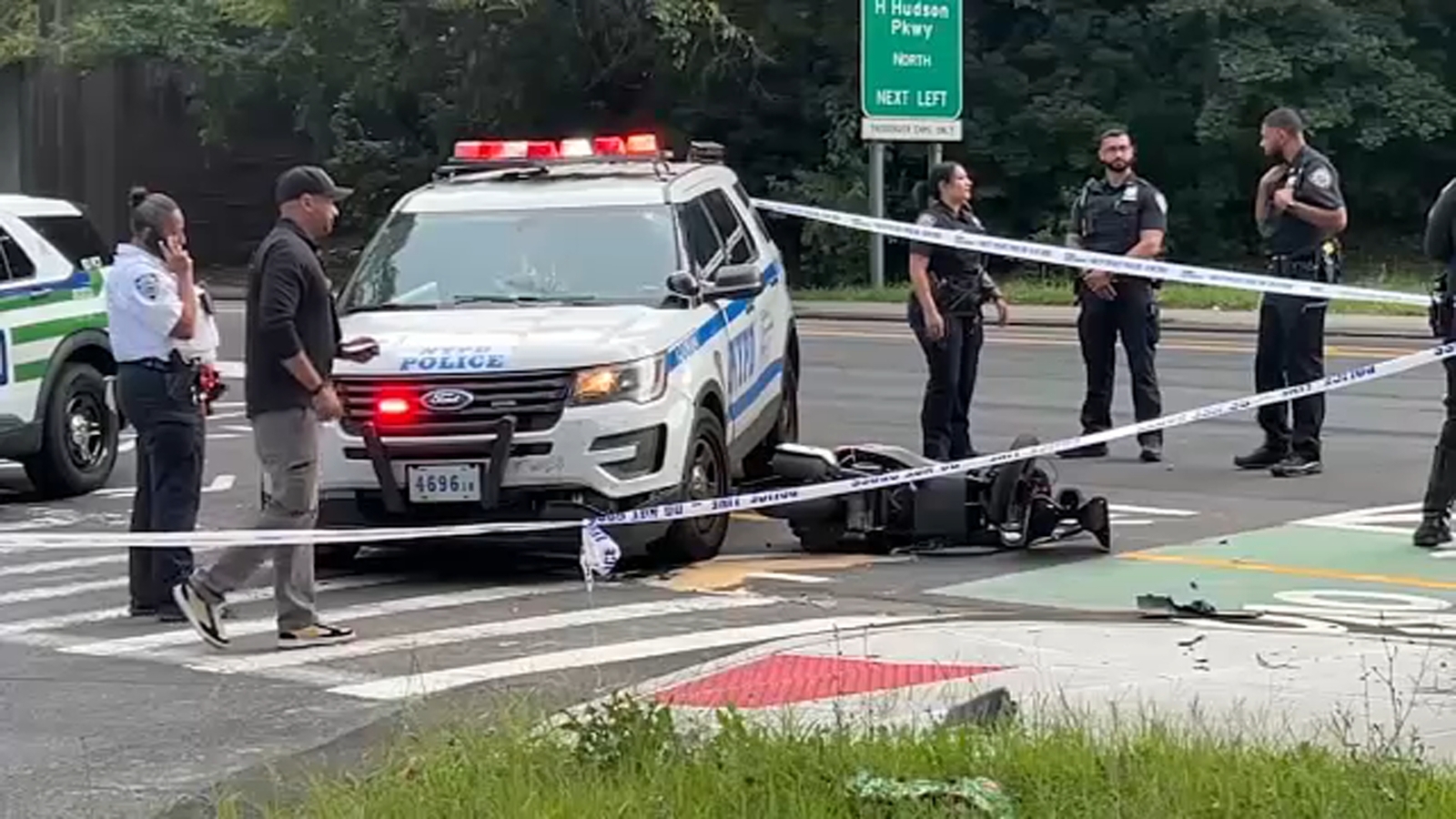 Man riding moped hospitalized after being hit by NYPD cruiser in the ...