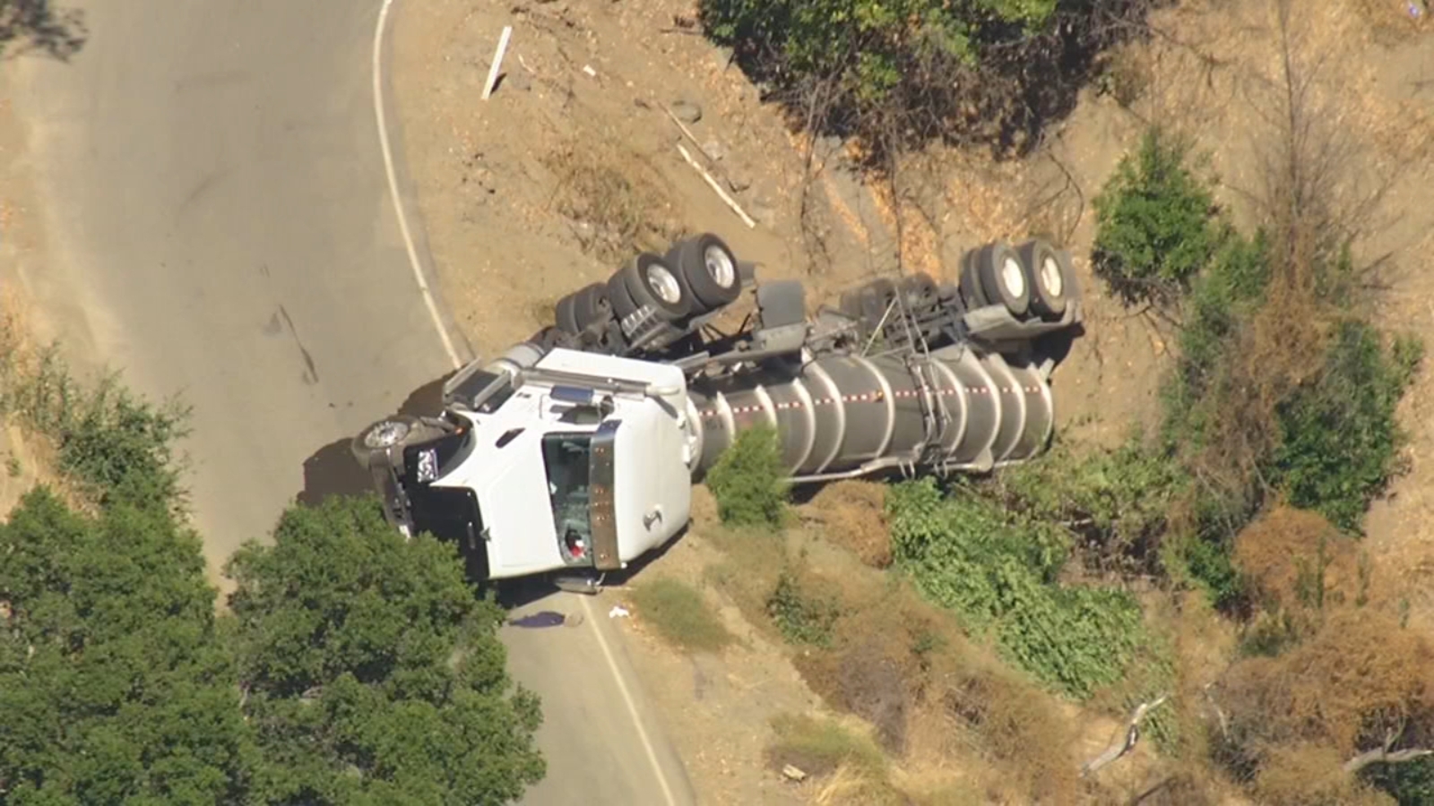 18wheel tanker overturns on East Bay road while navigating turn, California Highway Patrol says