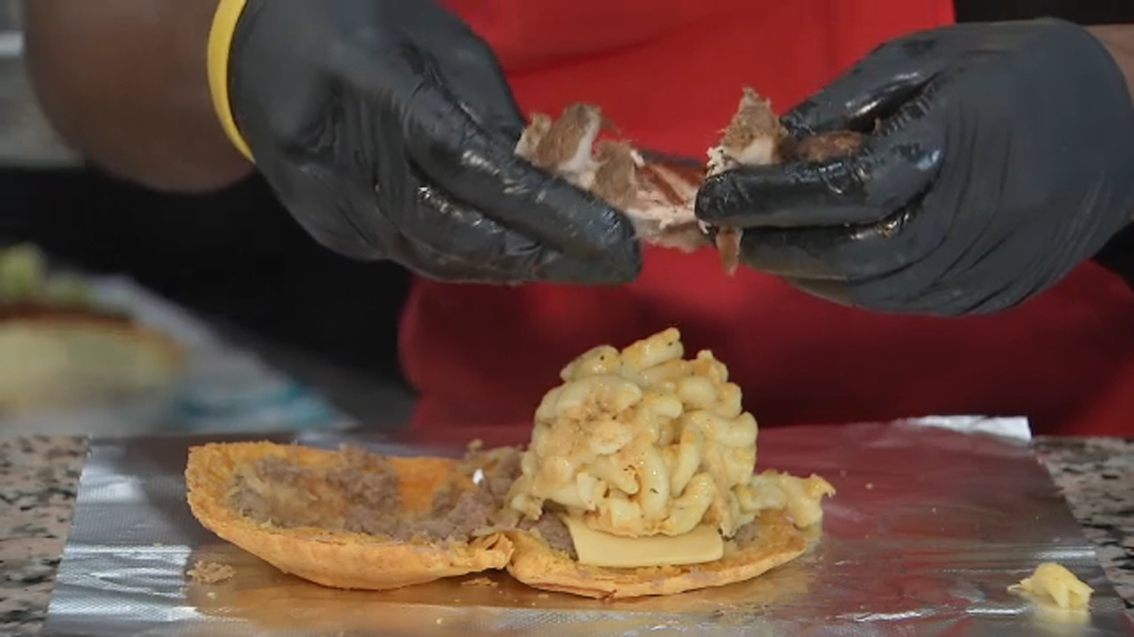 Datz Deli in Hollis, Queens serves up the Mac Patty alongside Caribbean