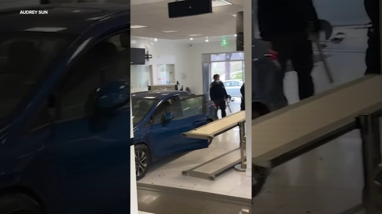 Witness says man who rammed car into Chinese Consulate 'had a knife'