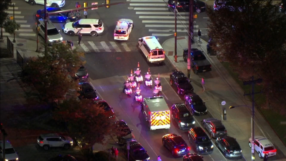Procession held for officer fatally shot at airport parking garage 