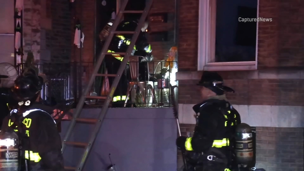 Chicago firefighter falls through floor while battling S. Side blaze
