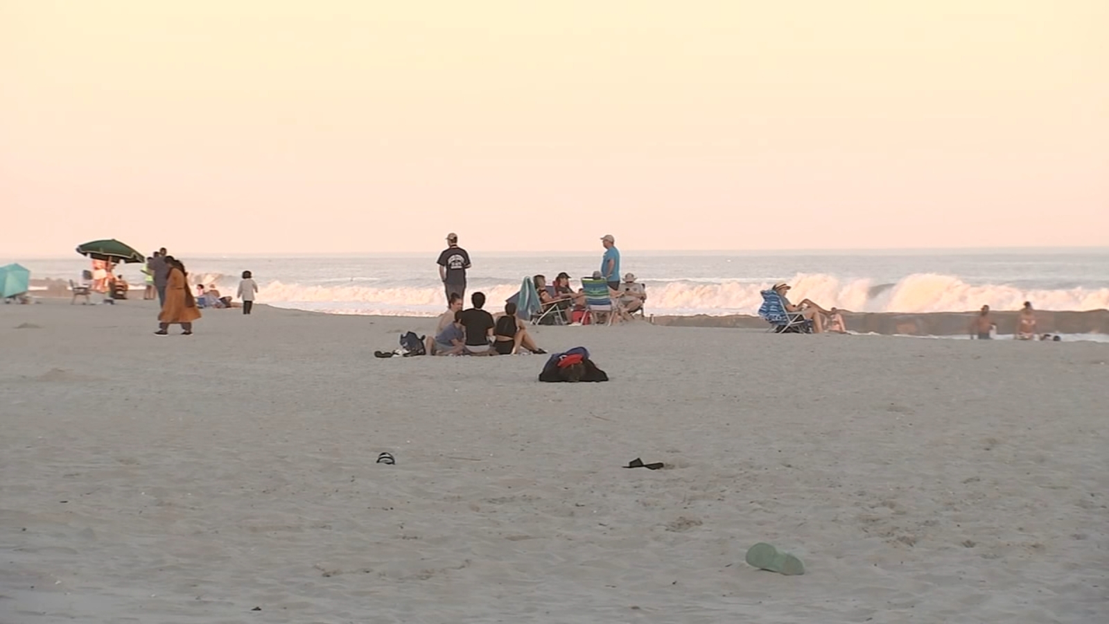 Residents soak up sun on October day with summer temps some spending time at Jersey shore