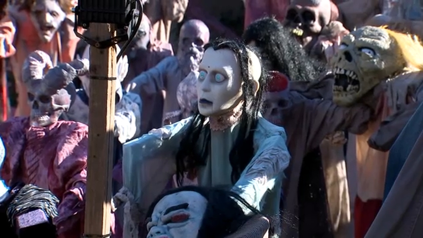 Zombies made from scratch fill front lawn of home in Hawthorne NJ for Halloween