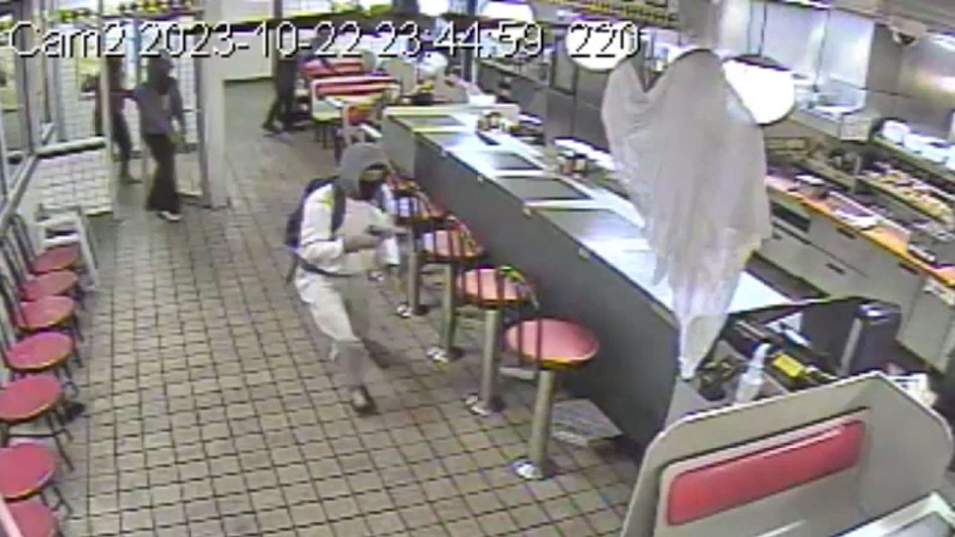 4 men storm into busy restaurant, force patrons on ground, video shows