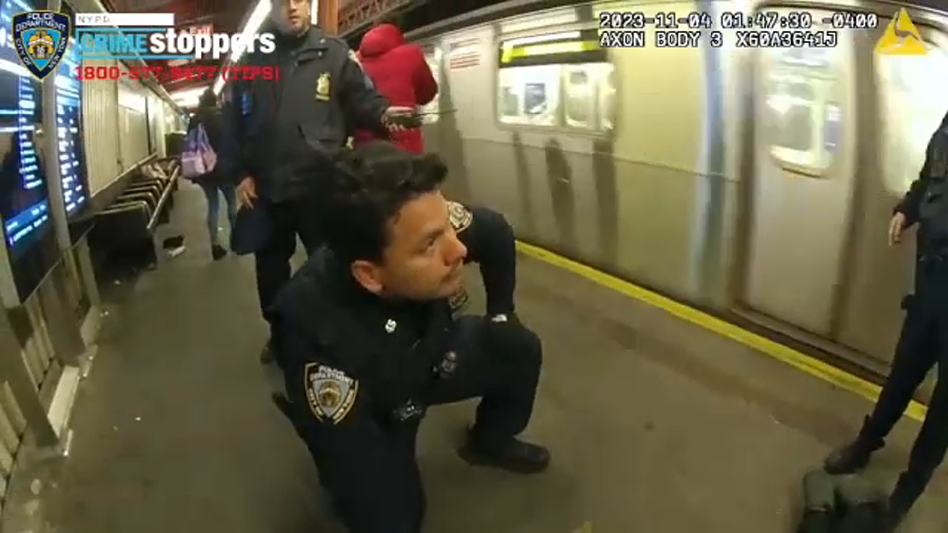 NYPD officers rescue man who fell on train tracks in Queens