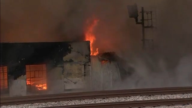 Crews battling 26,000 square-foot warehouse fire near downtown
