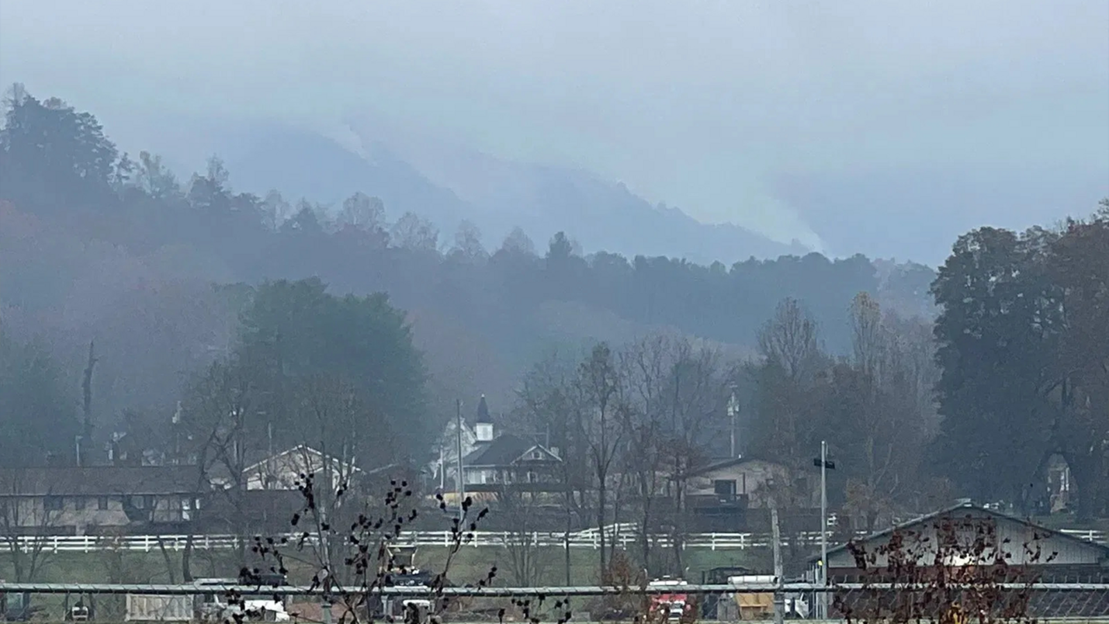 Despite rain, largest Western NC wildfire grows, threatens structures