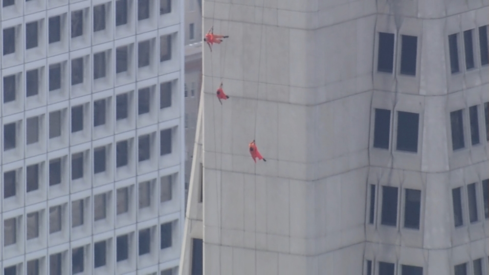 Aerial performance troupe rappels down SF's Transamerica Pyramid