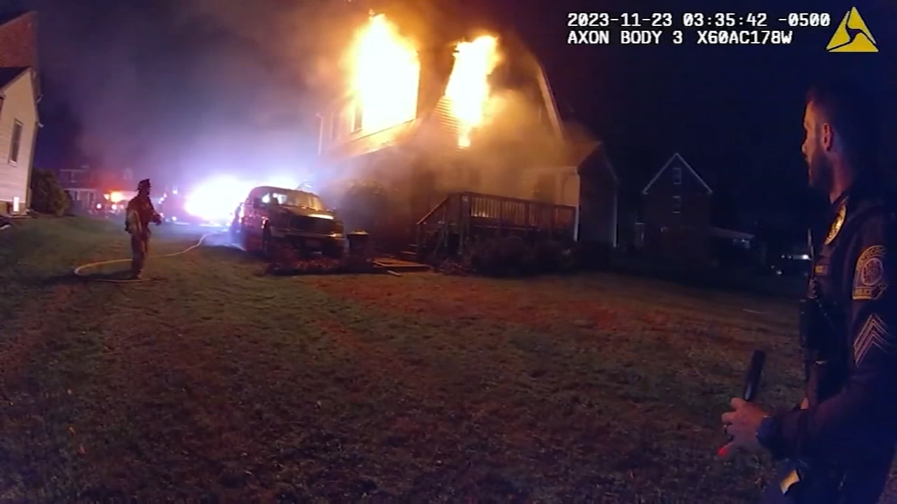 Bodycam video shows officers rescuing elderly man from burning home