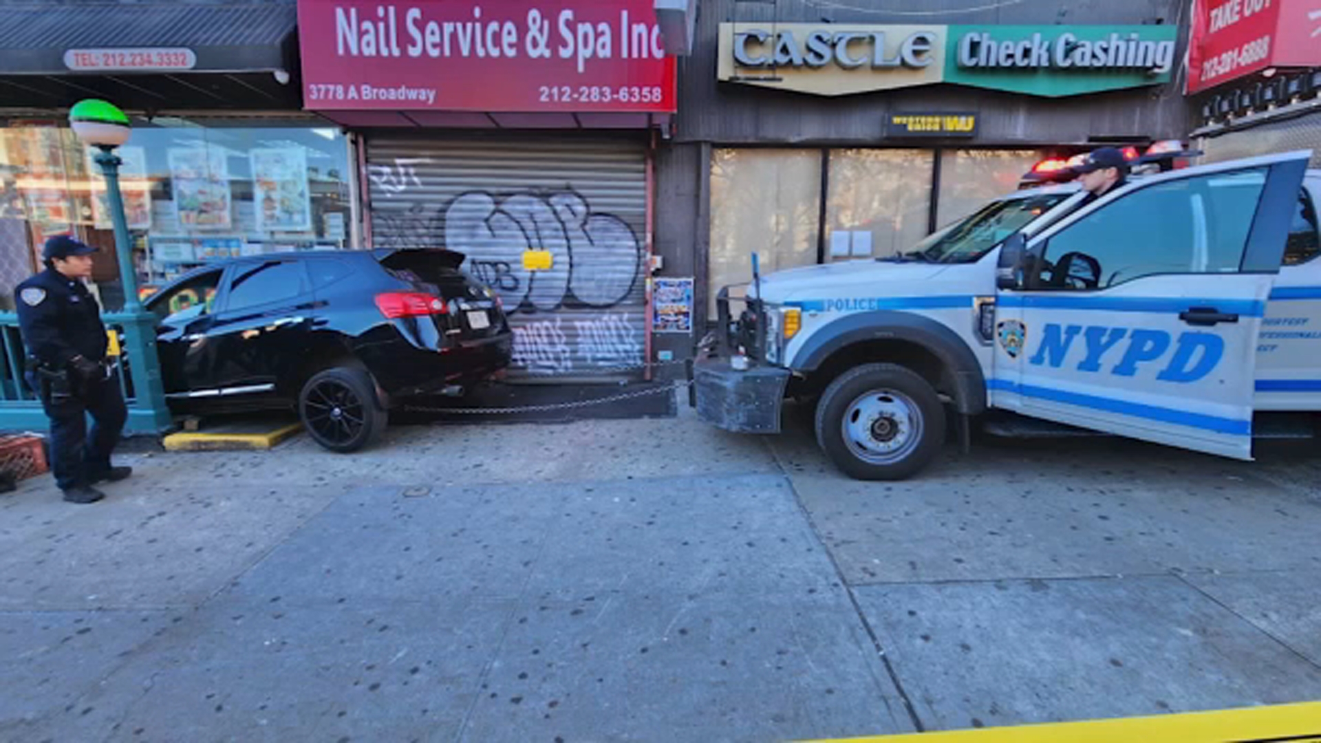 Driver charged after car crashes into subway entrance