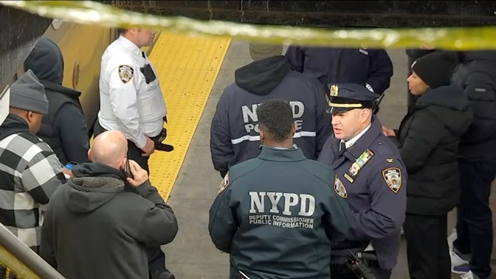 Teen and innocent bystander shot aboard subway train in Brooklyn