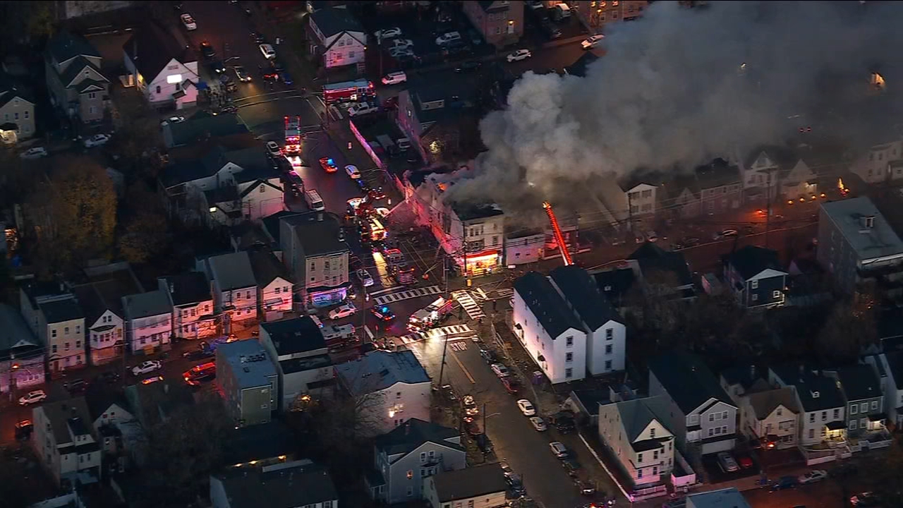 Crews battle house fire in Paterson