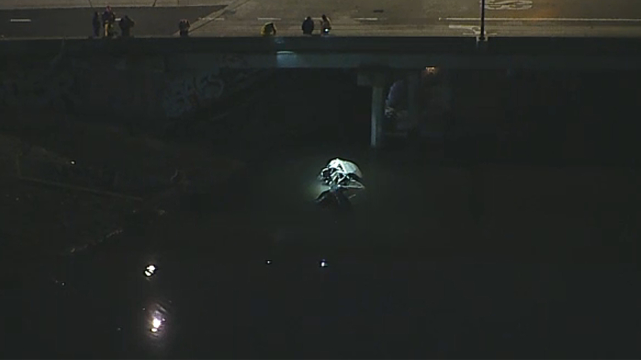 Vehicle plunges into Dominguez Channel in Carson amid rainy conditions