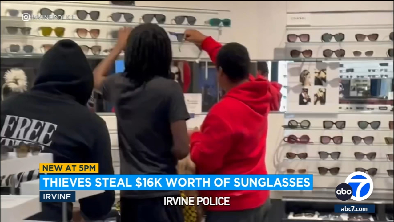 Caught on video: Thieves steal $16,000 worth of sunglasses  display picture 2