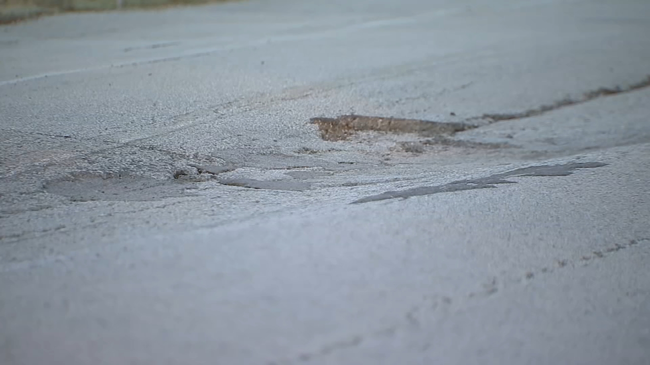 3 injured after large pothole causes garbage truck to flip over: HSCO