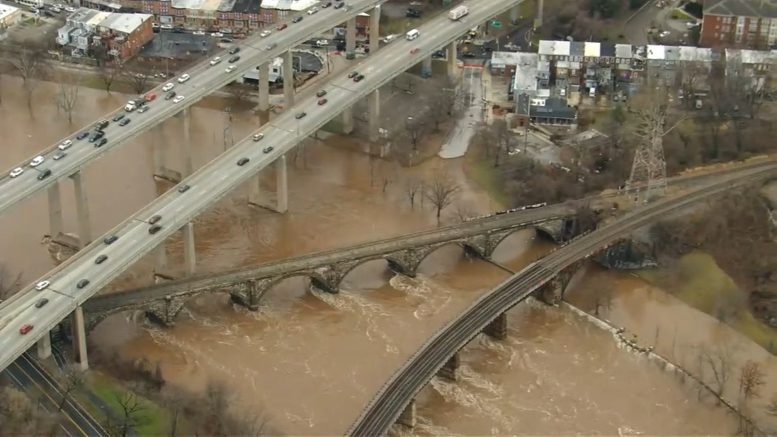 Aerial video exhibits flooding alongside the Schuylkill River and Kelly