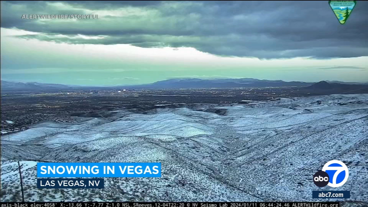 Snow falls in Las Vegas area following fast-moving cold front 
