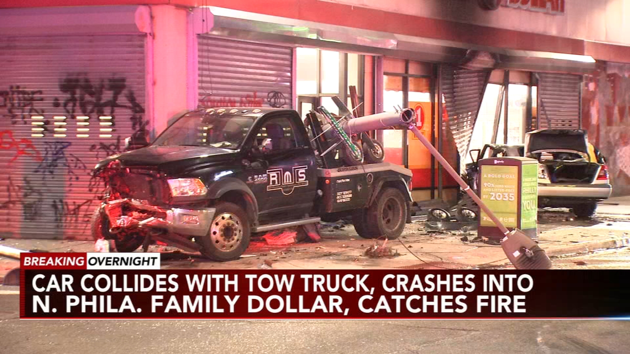 Car collides with tow truck, catches fire after crashing into North Philadelphia Family Dollar store