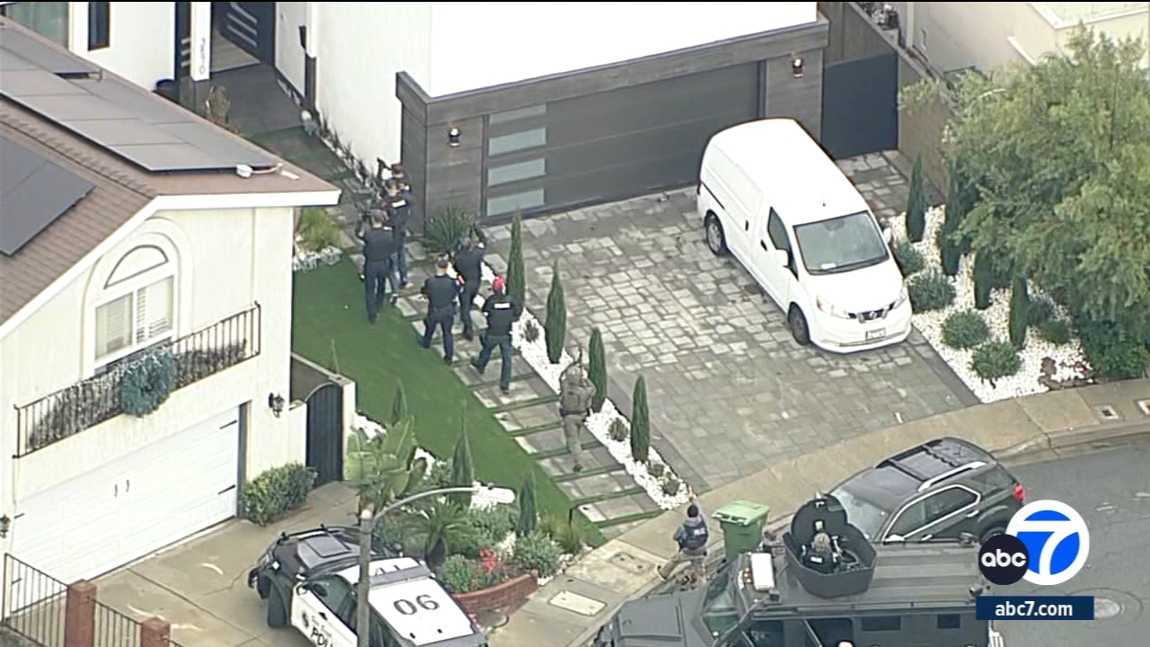 Suspect shot after authorities serve search warrant at Seal Beach home