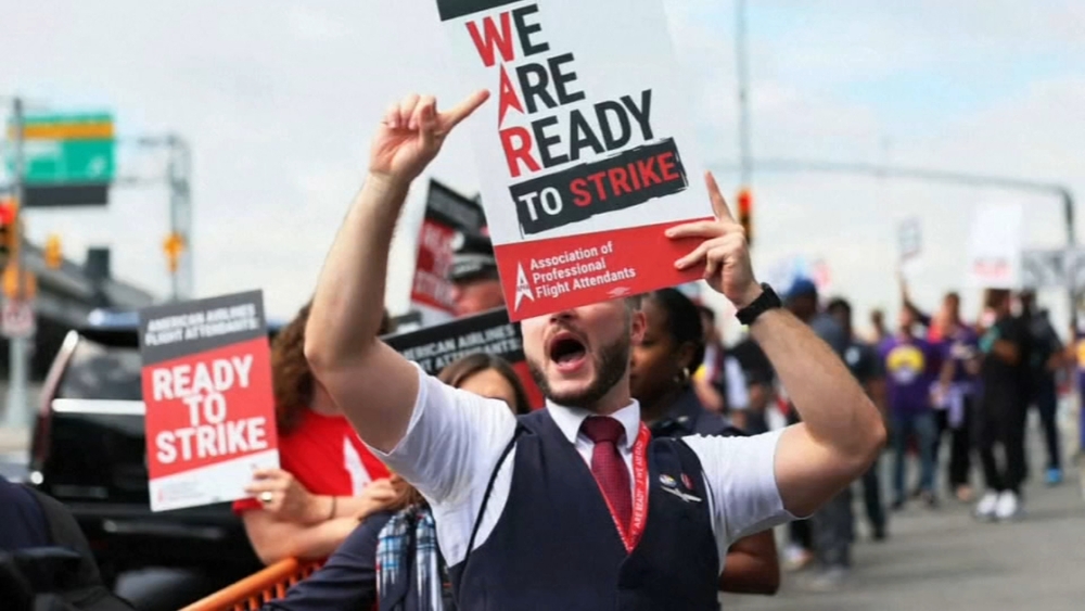 Flight attendants demand change, protest over lack of new contracts and pay raises