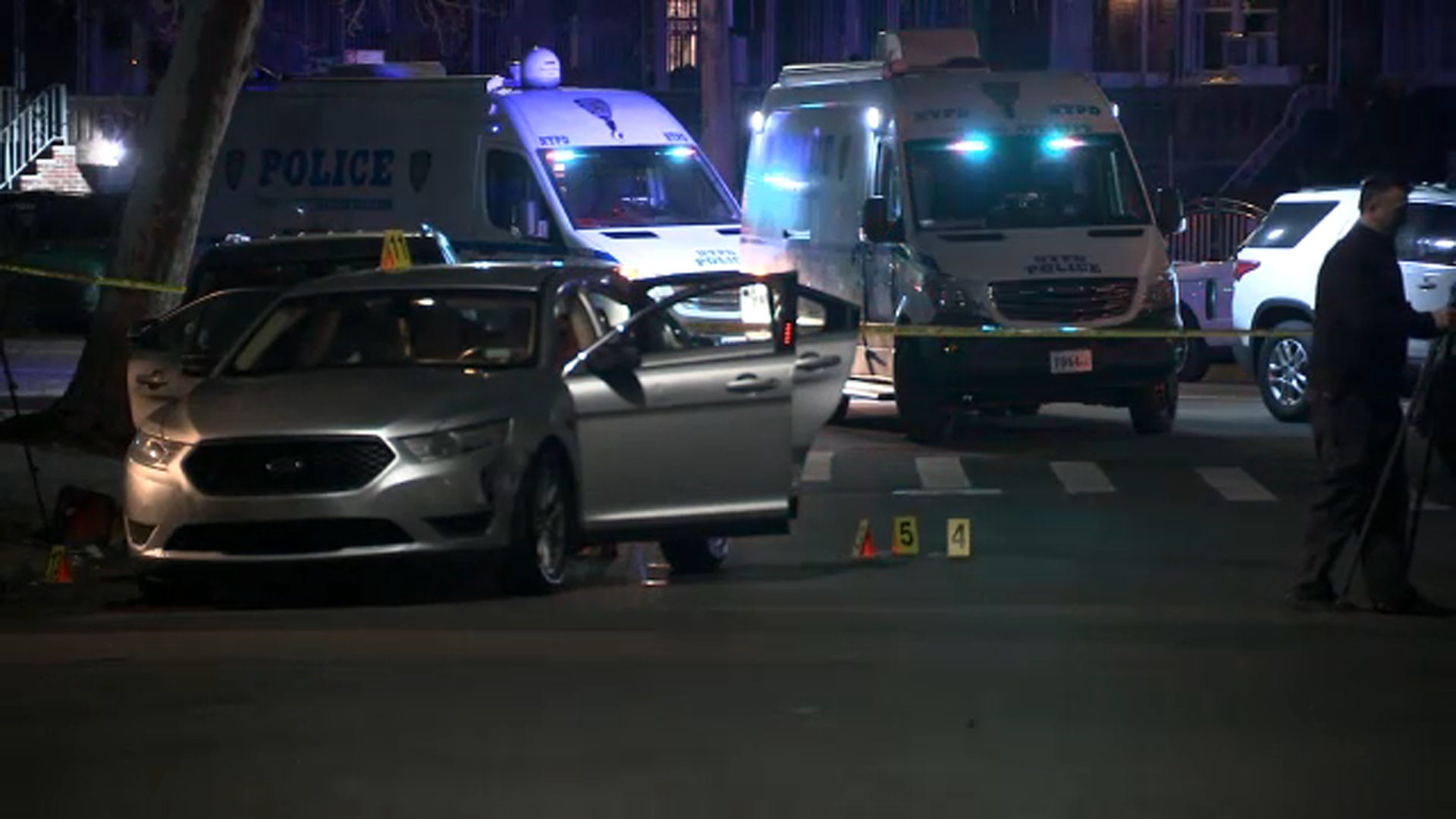 Police kill gunman chasing 2 people in Brooklyn