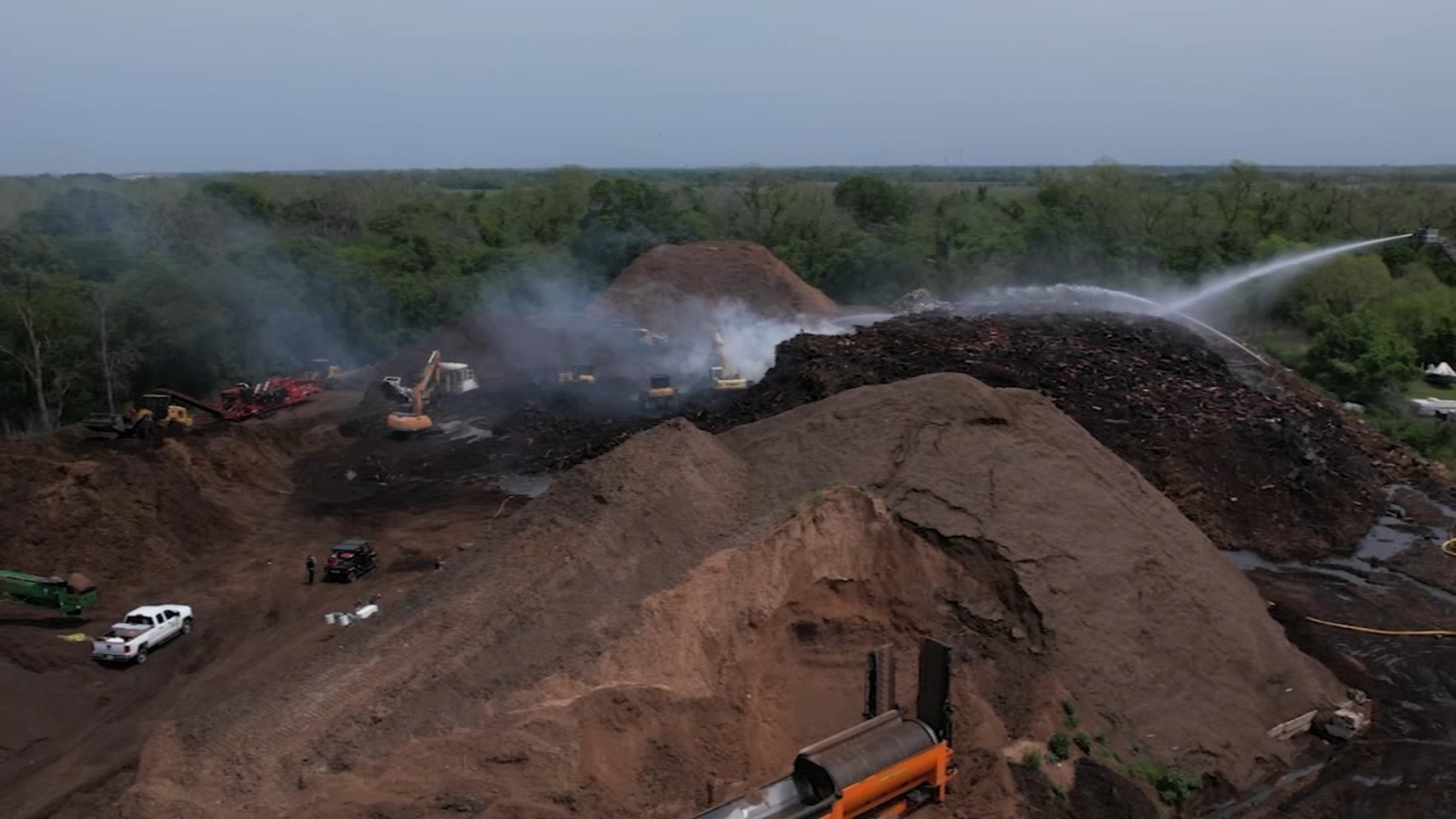 Richmond, Texas, debris pile Crews from 14 different agencies battle
