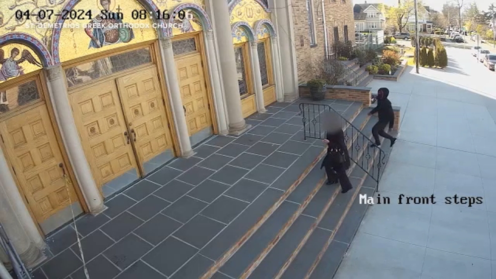 Woman in critical condition after punching attack on church steps