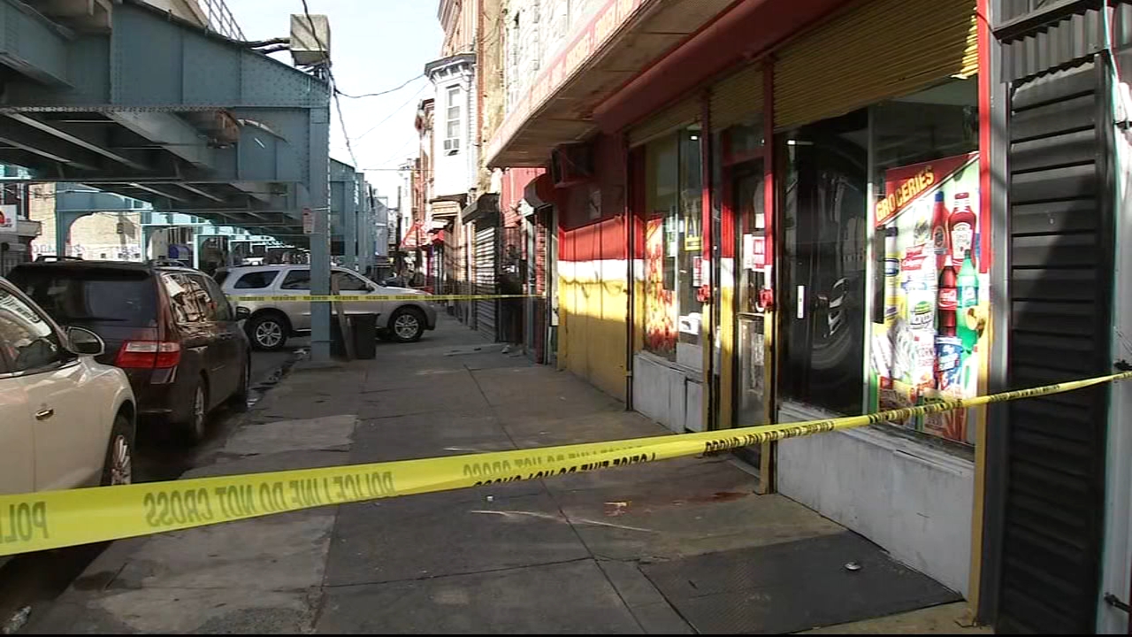 Man fatally shot inside store in Kensington; suspect in custody
