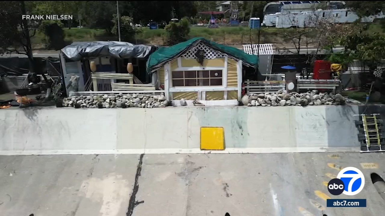 Homeless man builds makeshift home next to 110 Freeway