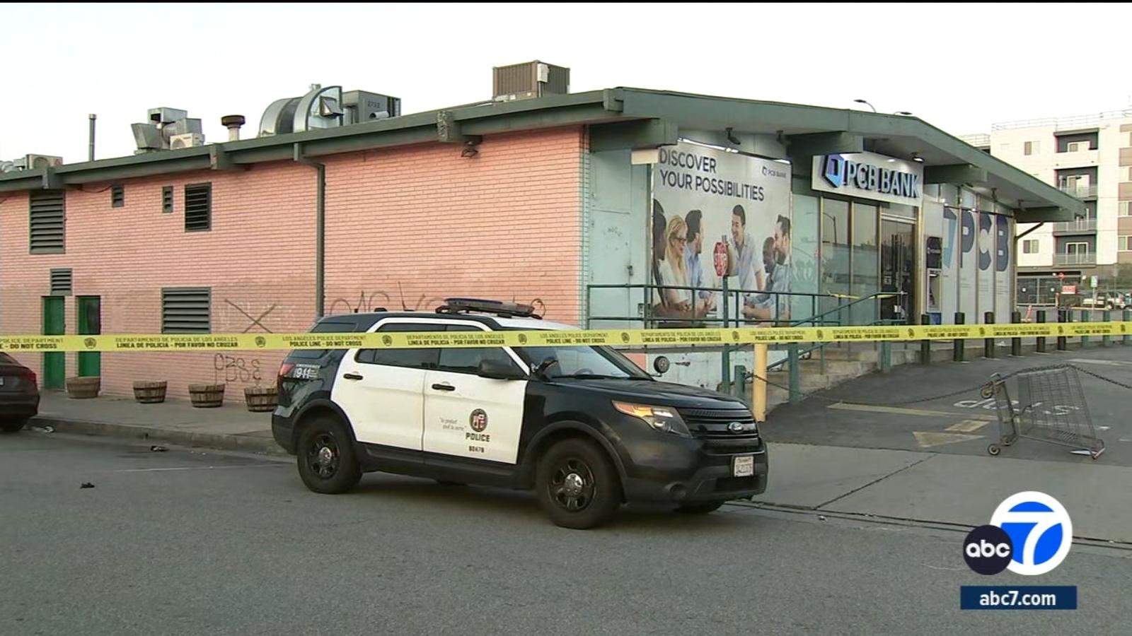 Security guard hospitalized after being stabbed outside bank in ...