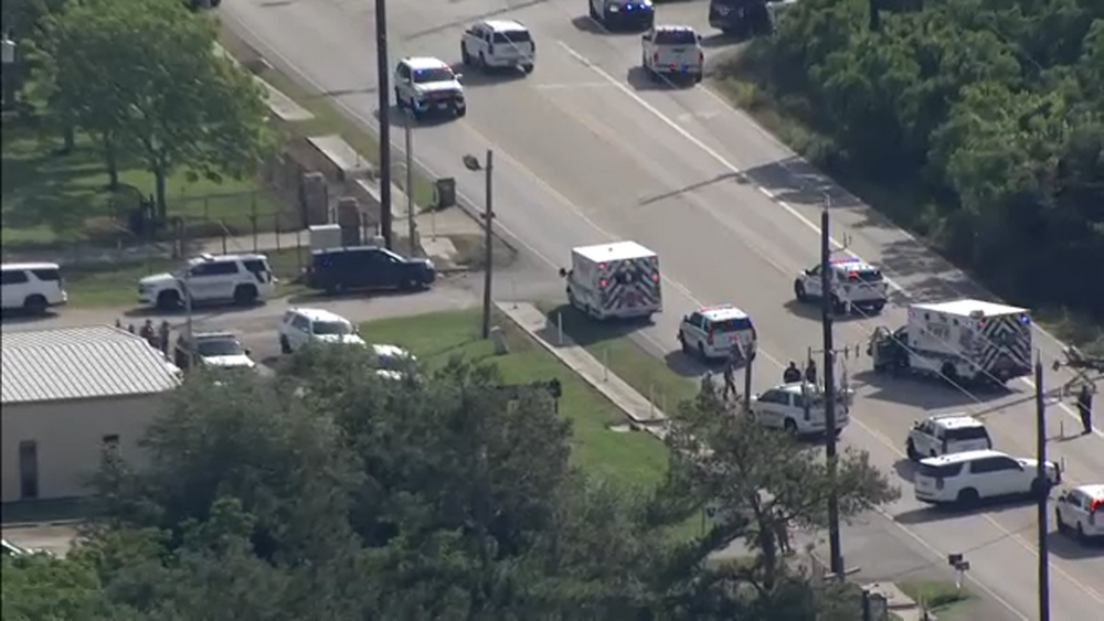 Suspect shot to death after holding ex-wife and toddler at gunpoint in car, officials say