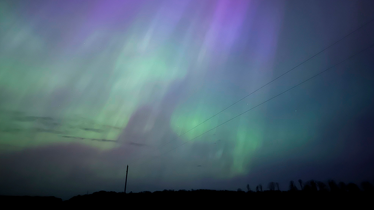 The Northern Lights glow in the sky near Kroschel, Minnesota.