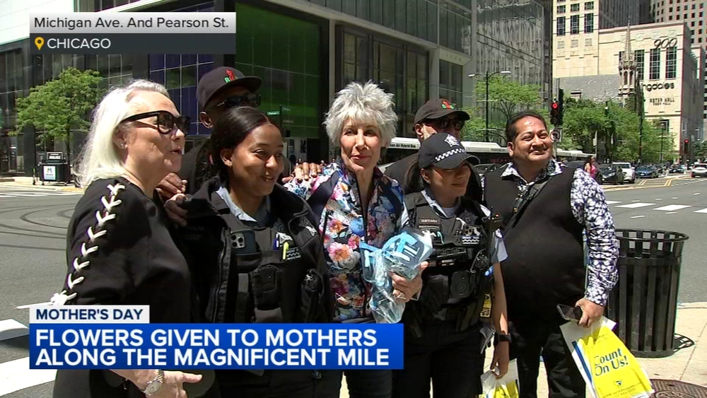 Cook County Treasurer hands out flowers for Mother's Day