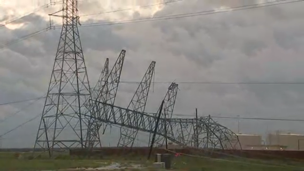 Destructive storm leaves downed power transmission lines